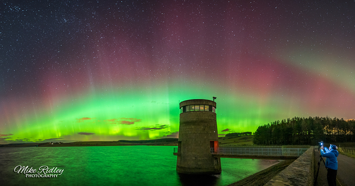derwent reservoir with Northern Lights in sky by Mike Ridley